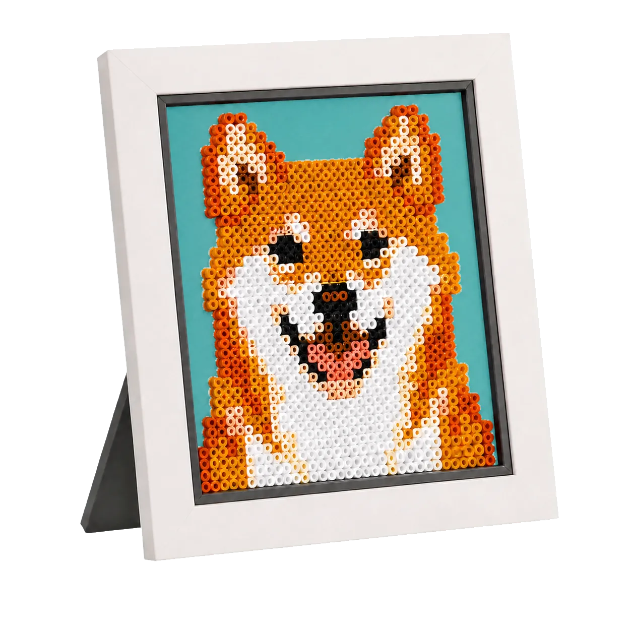 Finished Shiba fuse bead portrait in a light-stone tabletop frame