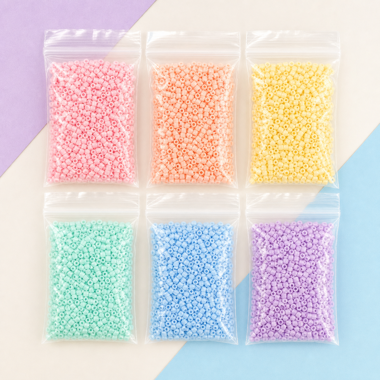 Six clear bottles of pastel color mini fuse beads